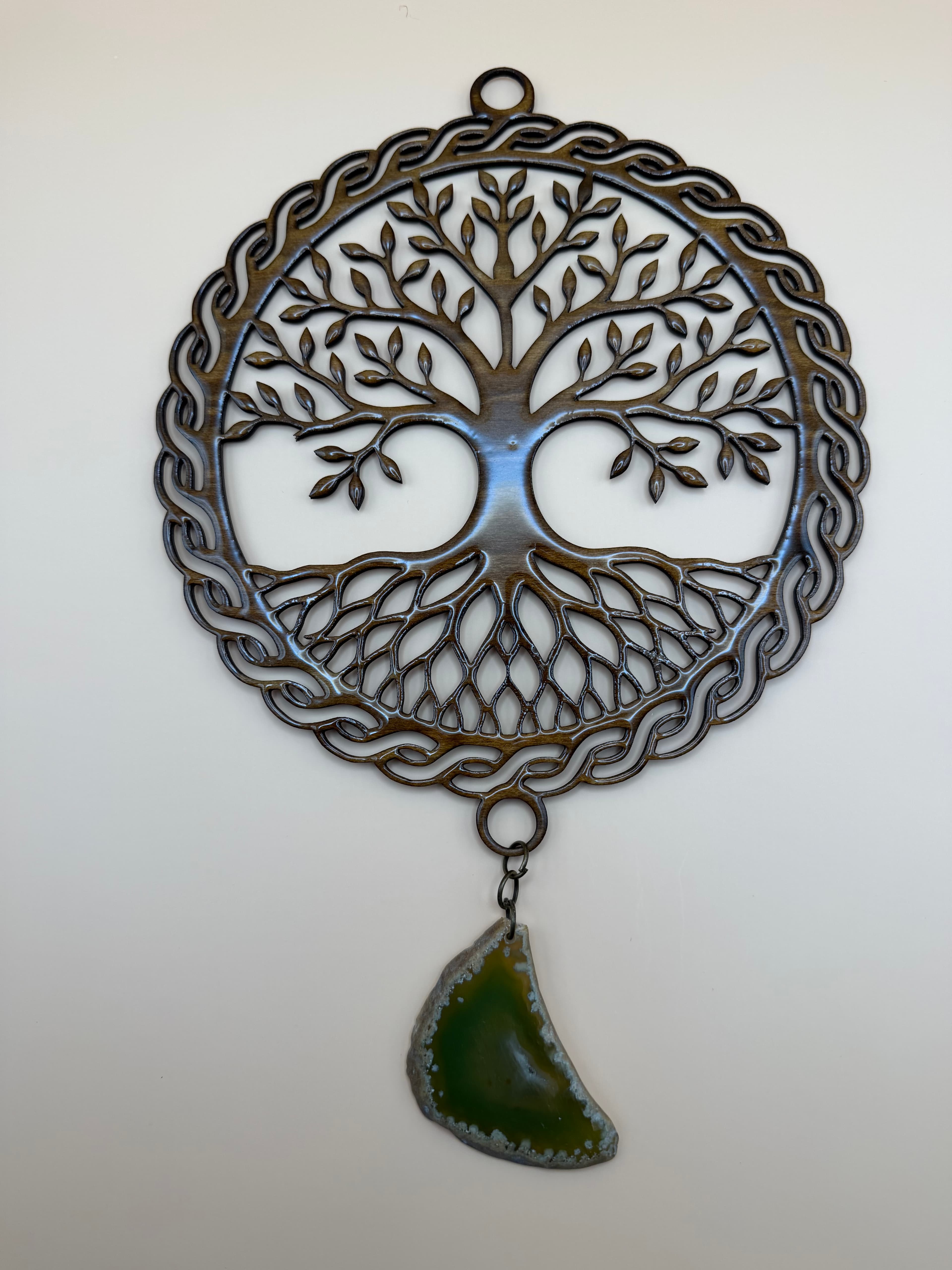 Dark wood Tree of Life wall hanging with Celtic knot border and green agate slice.