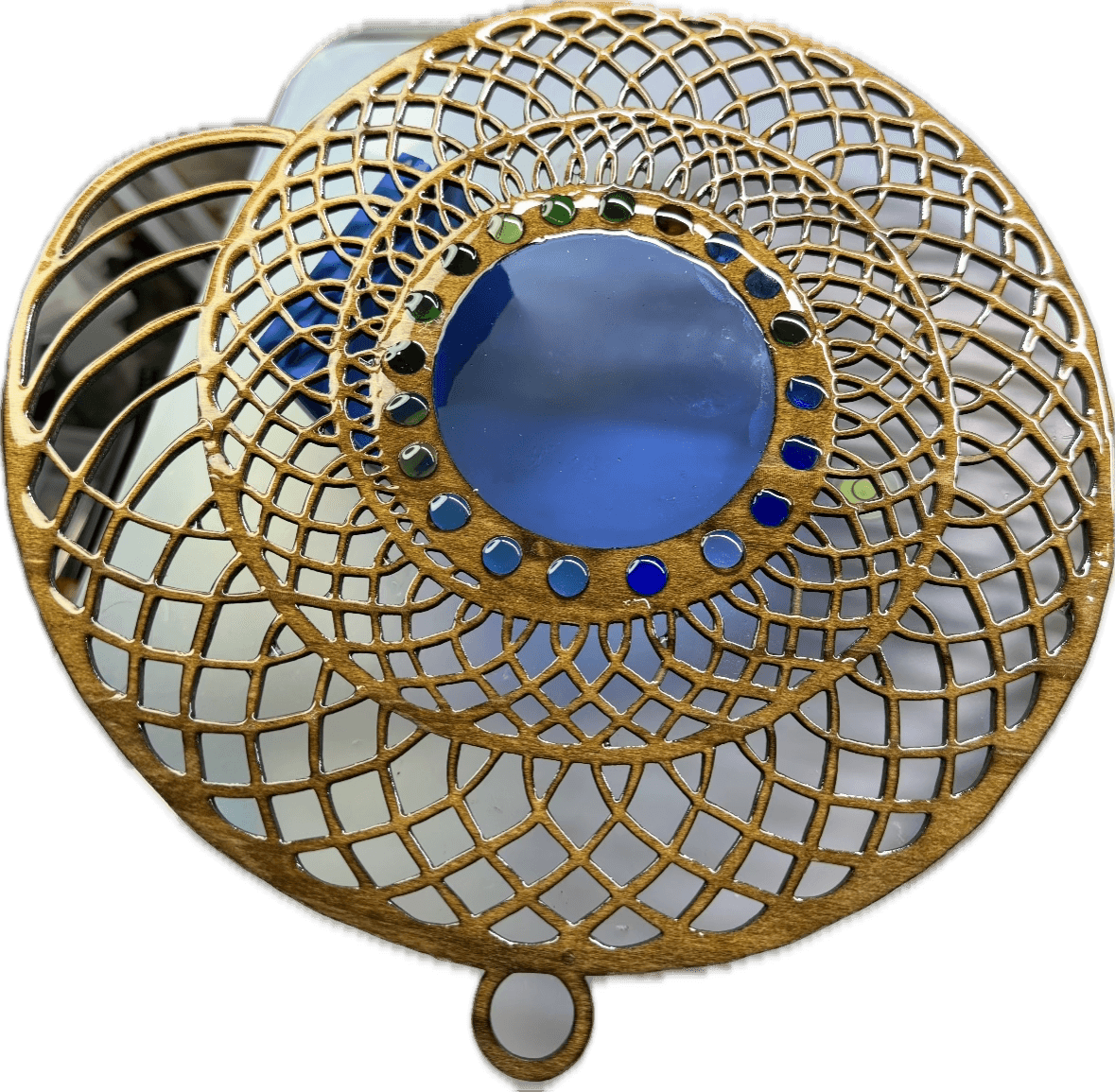 Intricate laser-cut wooden mandala with a large blue center and colorful glass bead accents.